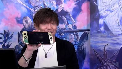 Naoki Yoshida holding a Nintendo Switch