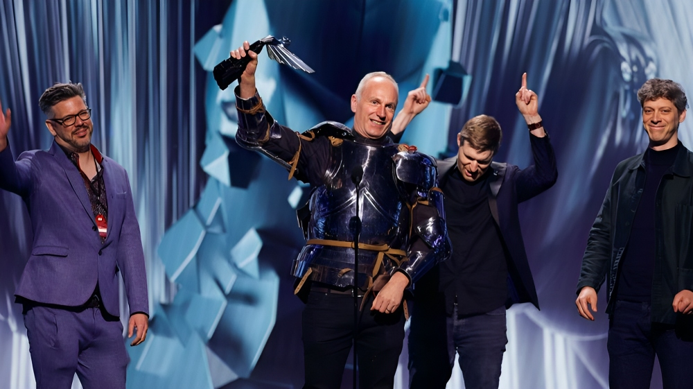 Swen Vincke Accepting Baldur's Gate 3's Game Of The Year Award In A Suit Of Armor