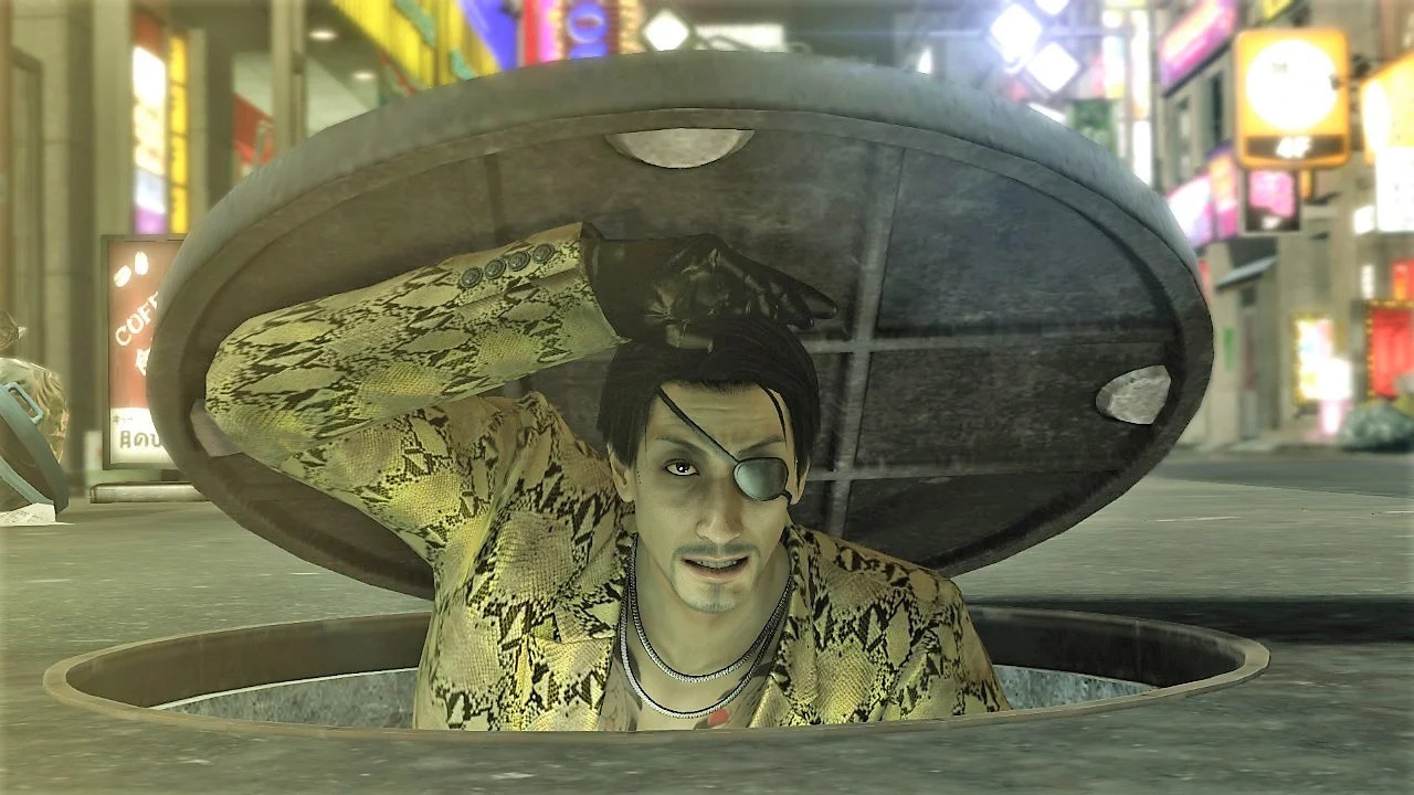 Majima sneaks out of a manhole in Yakuza Kiwami as part of the Majima Everywhere quest.